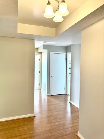 a view of a livingroom with wooden floor