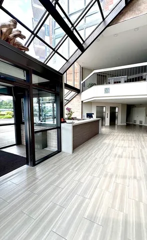 a view of swimming pool with seating space