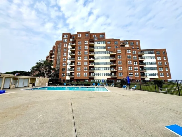 a view of a building with a street