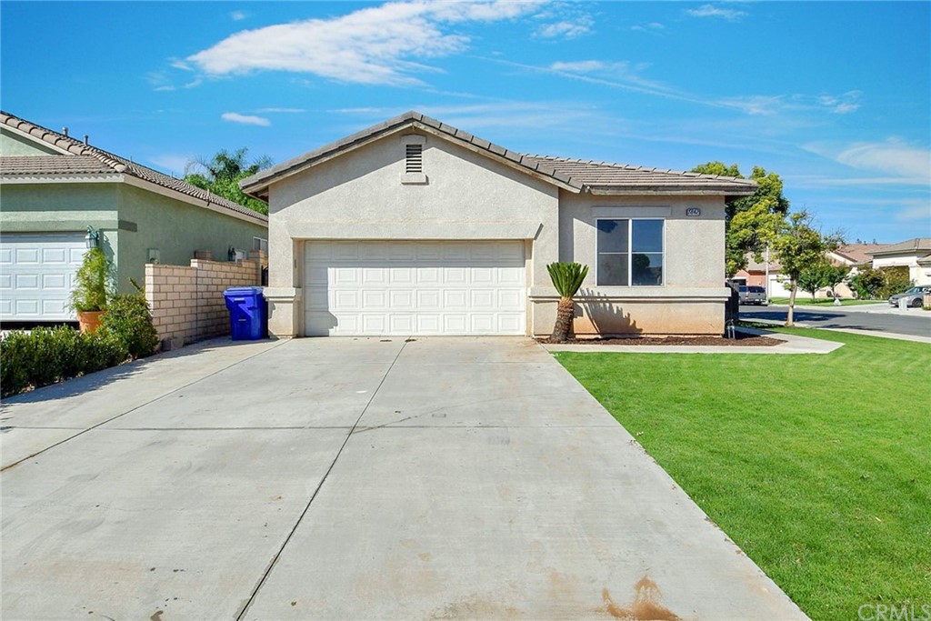 7842 Cameron Way Riverside, CA 92509 - Photo 1 of 1 a front view of house with yard and green space