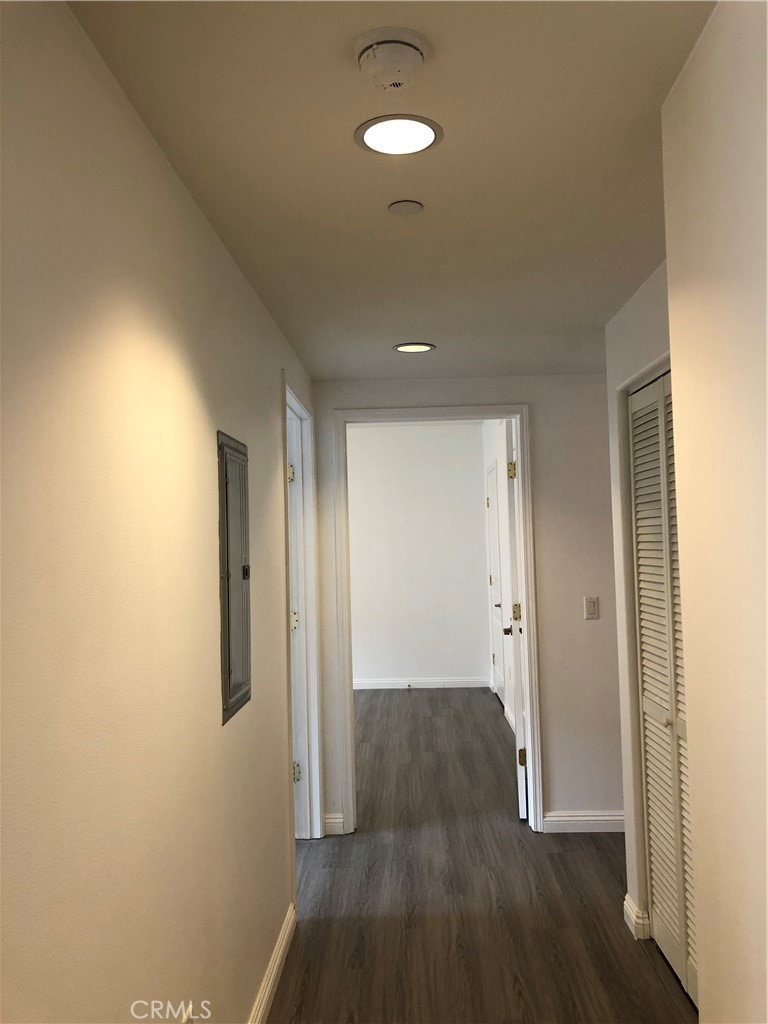 11 South 3rd Street, Unit 421 Alhambra, CA 91801 - Photo 13 of 17 a view of a hallway with wooden floor