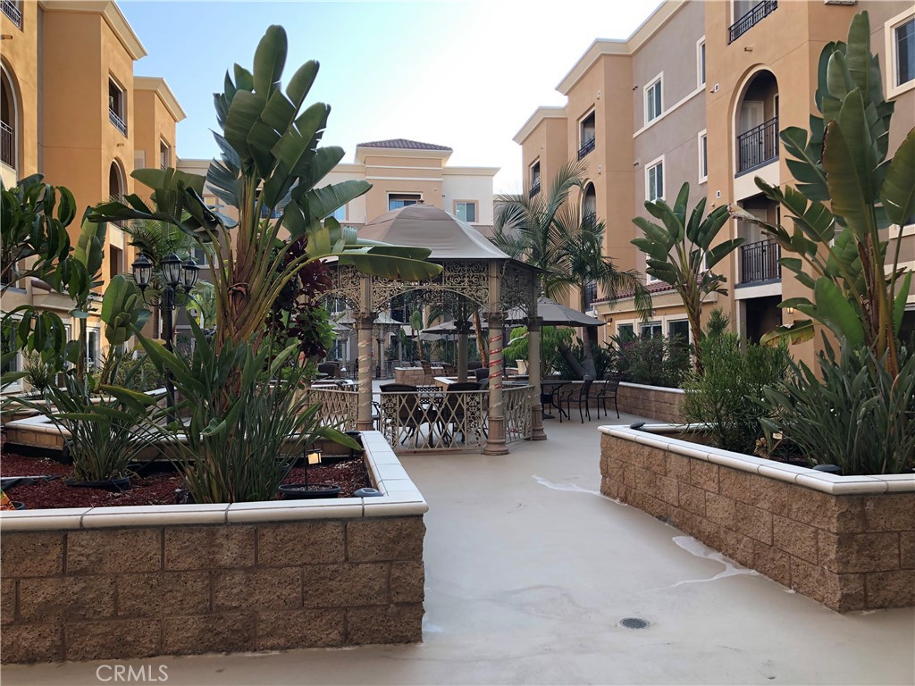 11 South 3rd Street, Unit 421 Alhambra, CA 91801 - Photo 3 of 17 a view of outdoor living area with seating space and potted plants