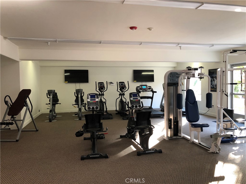 11 South 3rd Street, Unit 421 Alhambra, CA 91801 - Photo 4 of 17 a view of a room with gym equipment