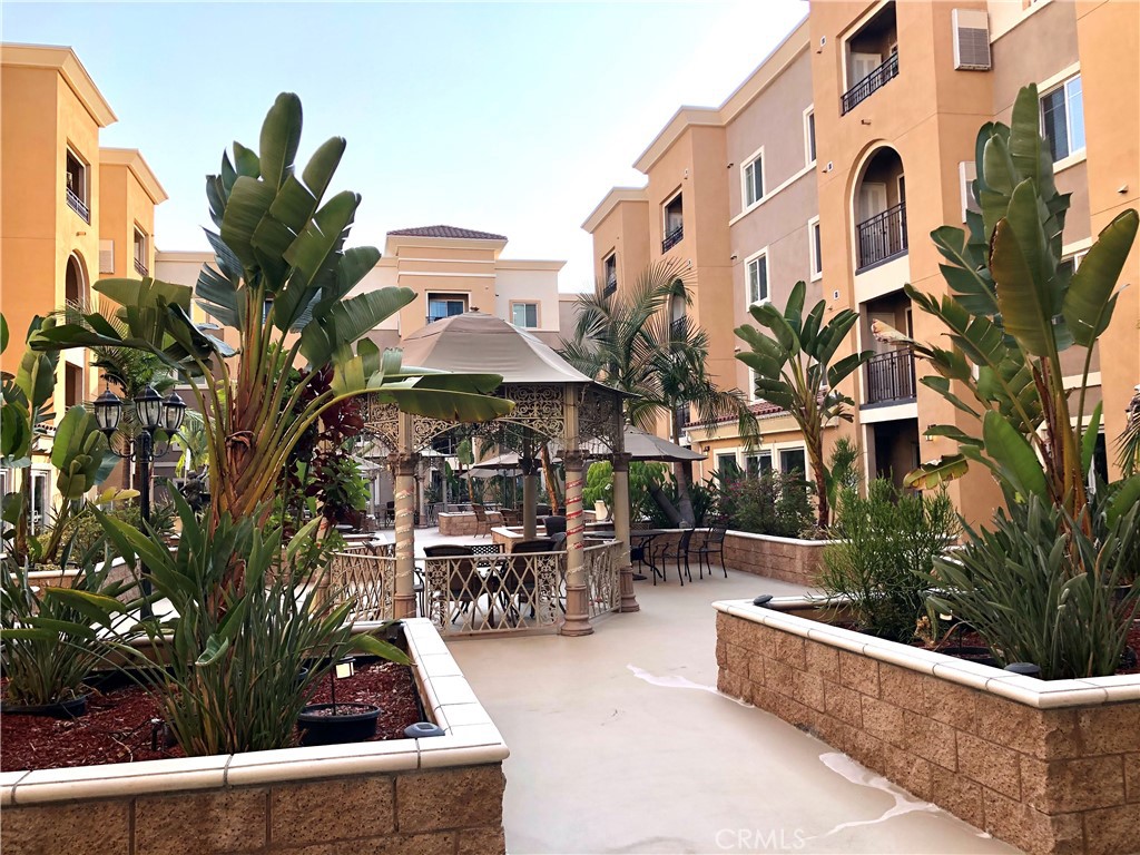11 South 3rd Street, Unit 421 Alhambra, CA 91801 - Photo 6 of 17 a view of a chairs and table in the patio