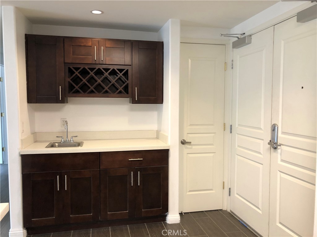 11 South 3rd Street, Unit 421 Alhambra, CA 91801 - Photo 7 of 17 a bathroom with a sink and a mirror