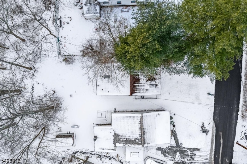 46 Wildwood Road Oak Ridge, NJ 07438 - Photo 3 of 6 a view of a tree front of the house