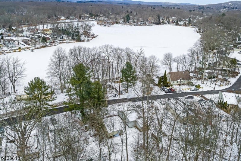 46 Wildwood Road Oak Ridge, NJ 07438 - Photo 4 of 6 a view of a lake from a balcony