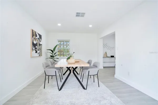 a view of a dining room with furniture
