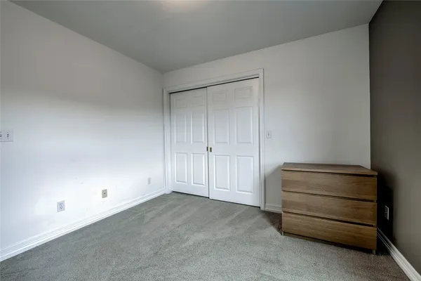 a view of room with air conditioner and window