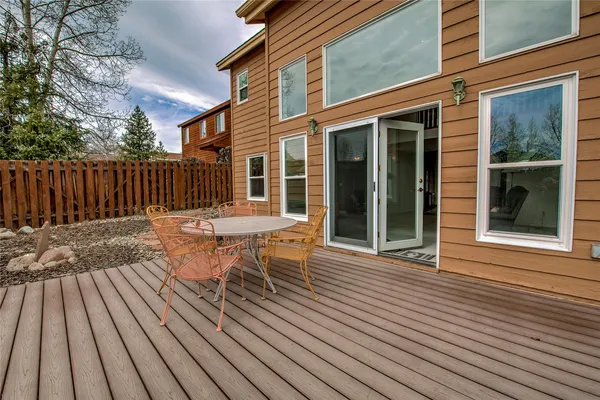 a view of outdoor sitting area with chairs