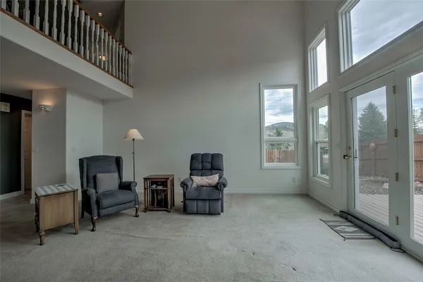 a room with furniture and a window