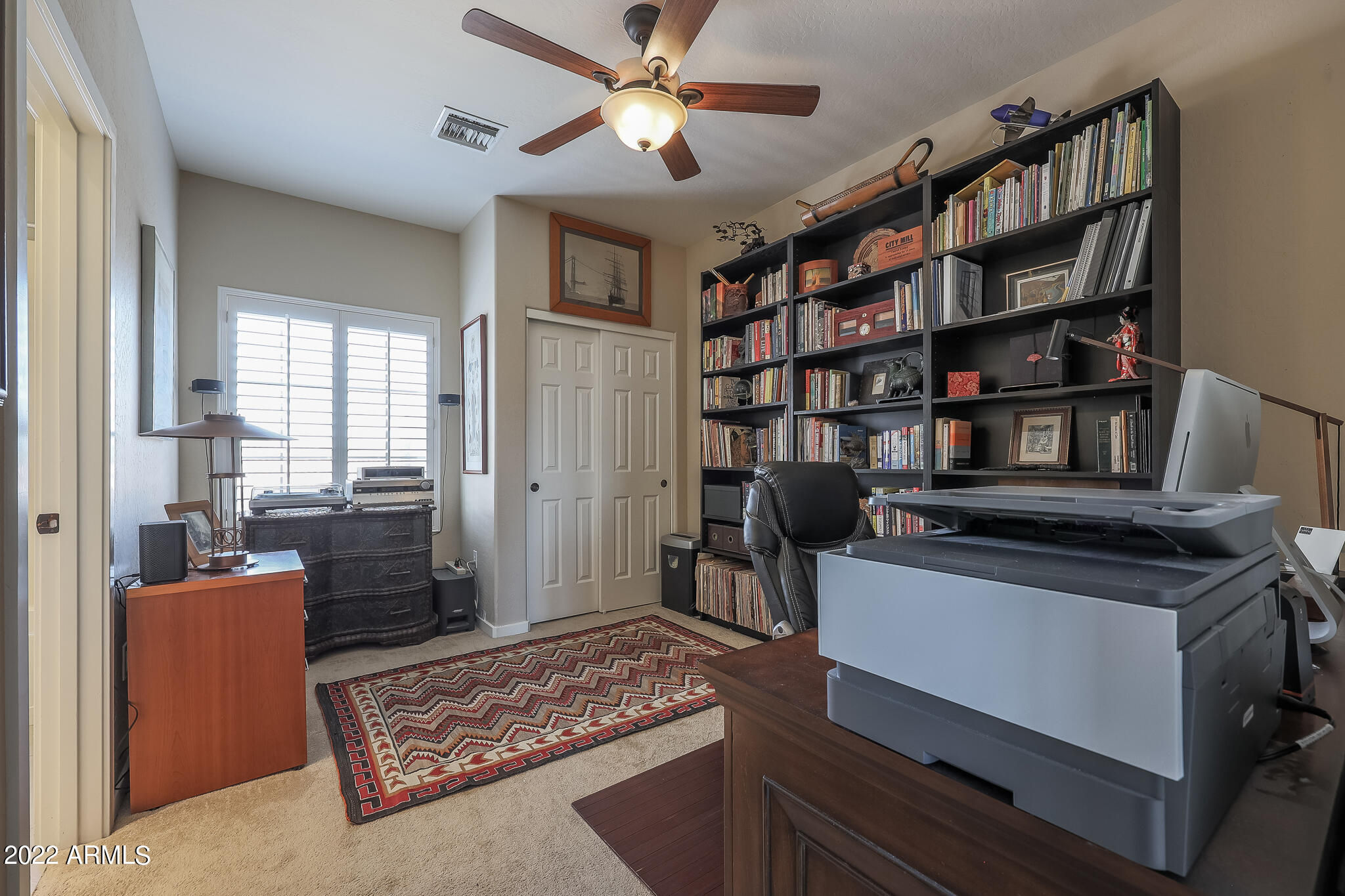 3935 East Rough Rider Road, Unit 1111 Phoenix, AZ 85050 - Photo 13 of 35 Guest bedroom
