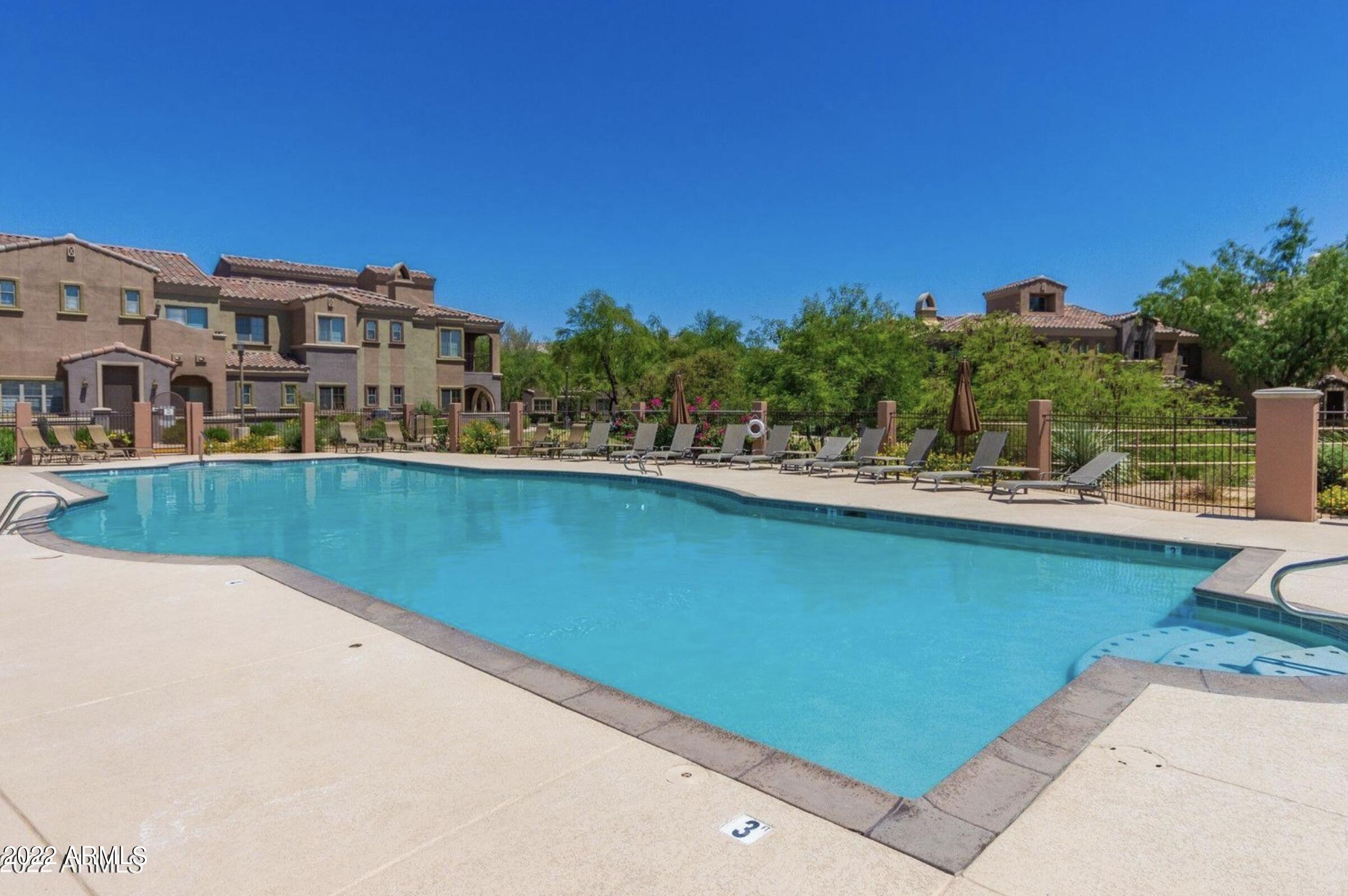 3935 East Rough Rider Road, Unit 1111 Phoenix, AZ 85050 - Photo 22 of 35 Villages private pool