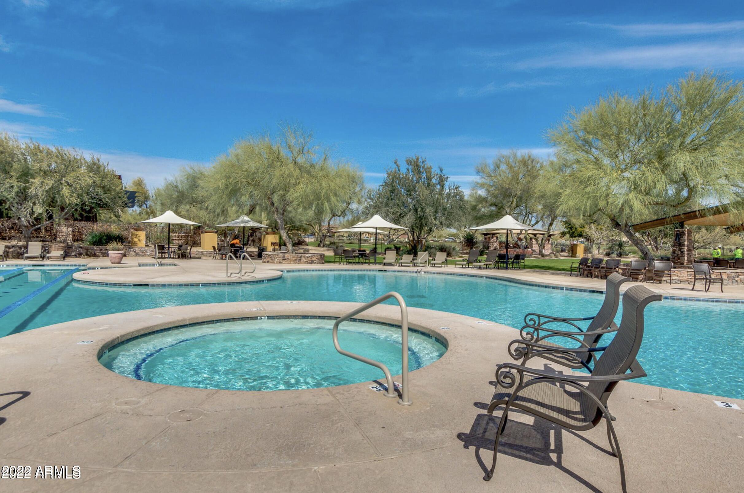 3935 East Rough Rider Road, Unit 1111 Phoenix, AZ 85050 - Photo 23 of 35 Aviano spa and pool