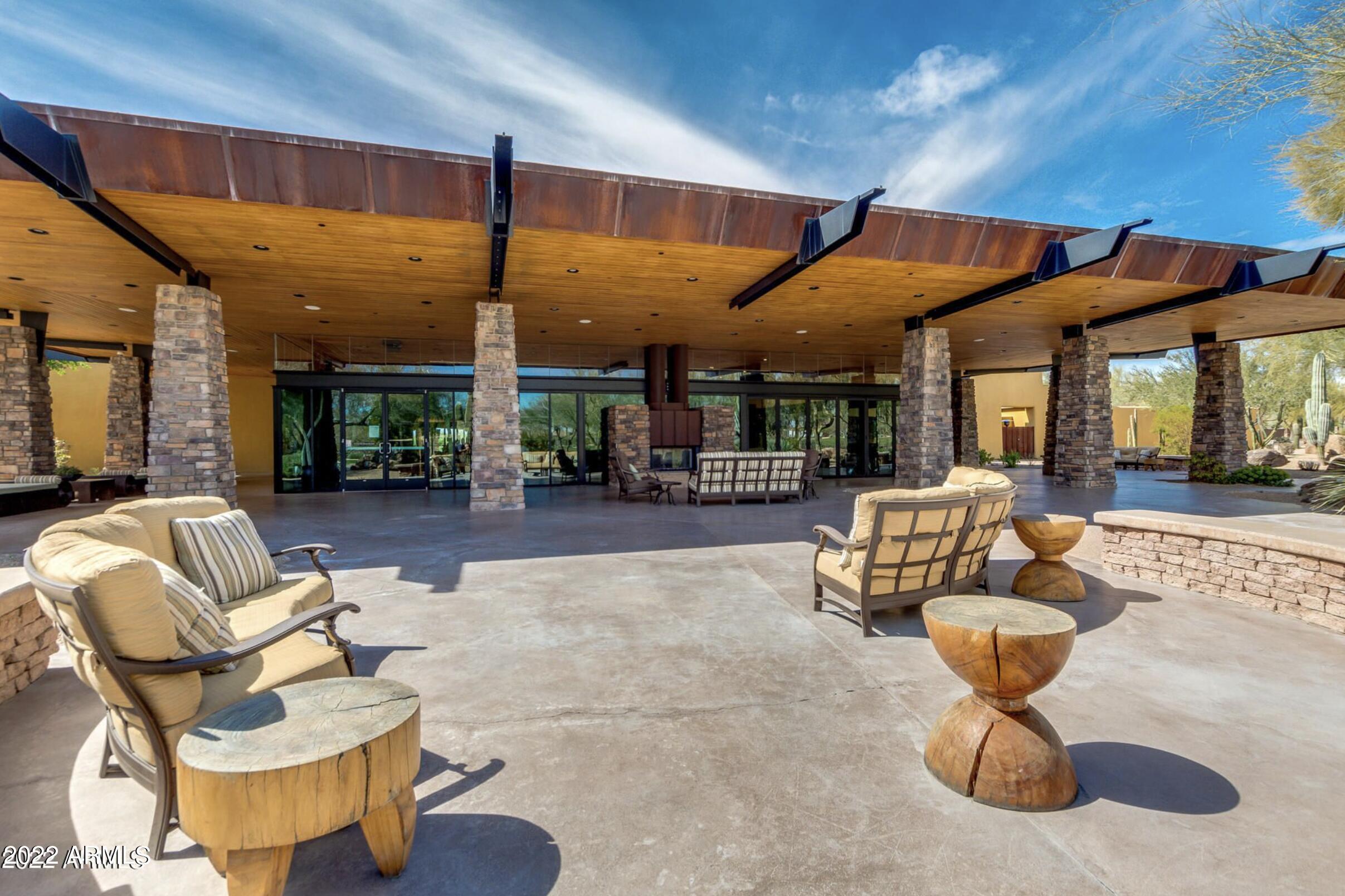 3935 East Rough Rider Road, Unit 1111 Phoenix, AZ 85050 - Photo 31 of 35 Outdoor community patio