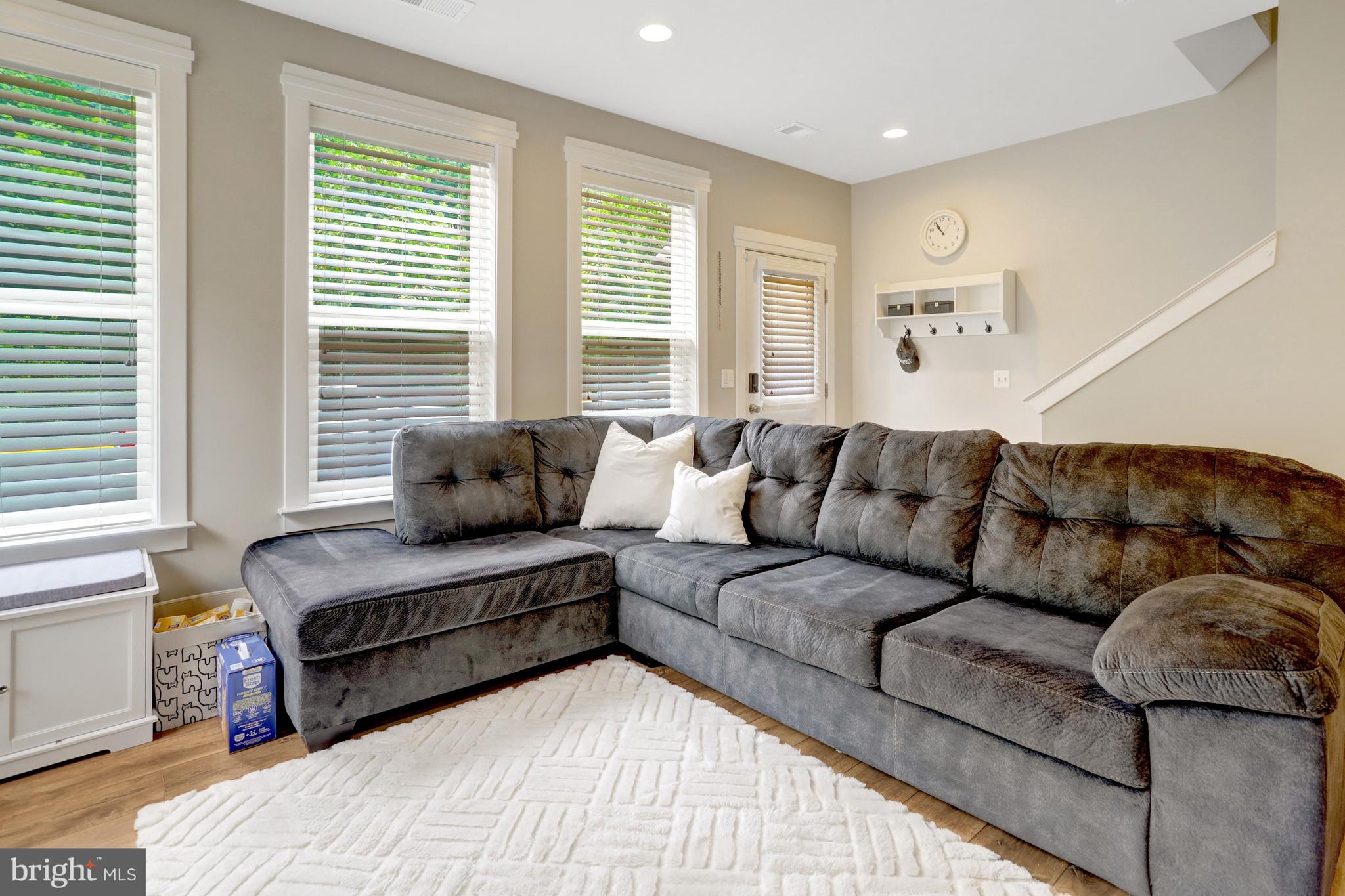 9180 Snowden Ashford Road Lorton, VA 22079 - Photo 5 of 28 a living room with furniture and a large window