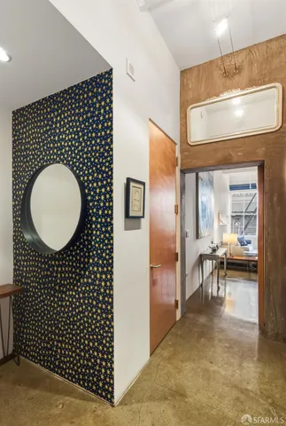 a living room with a wooden floor