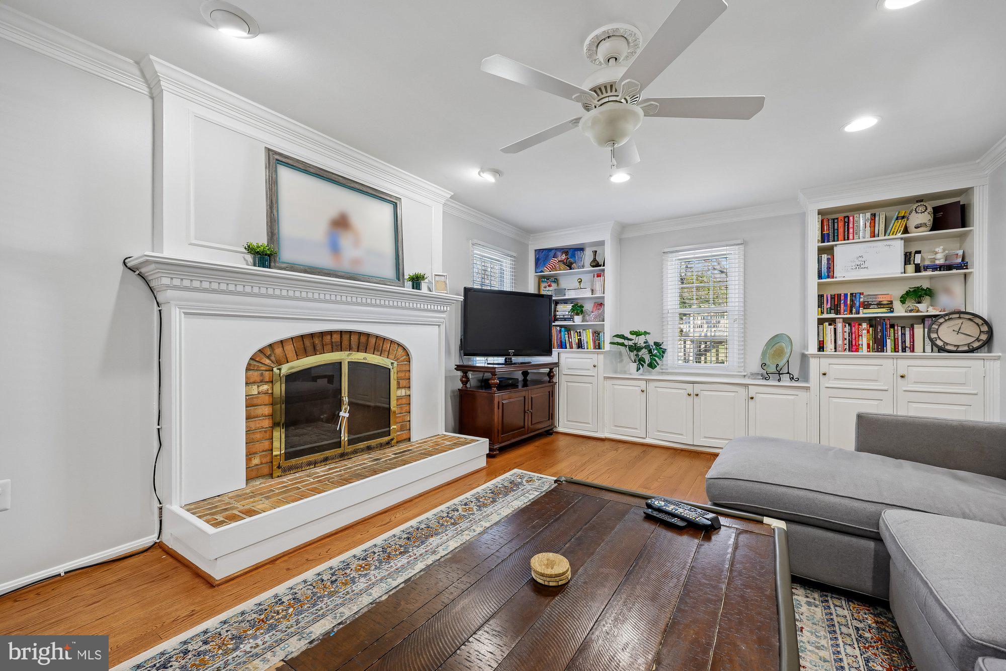 18 Kaywood Court Silver Spring, MD 20905 - Photo 28 of 71 a living room with furniture fireplace and flat screen tv