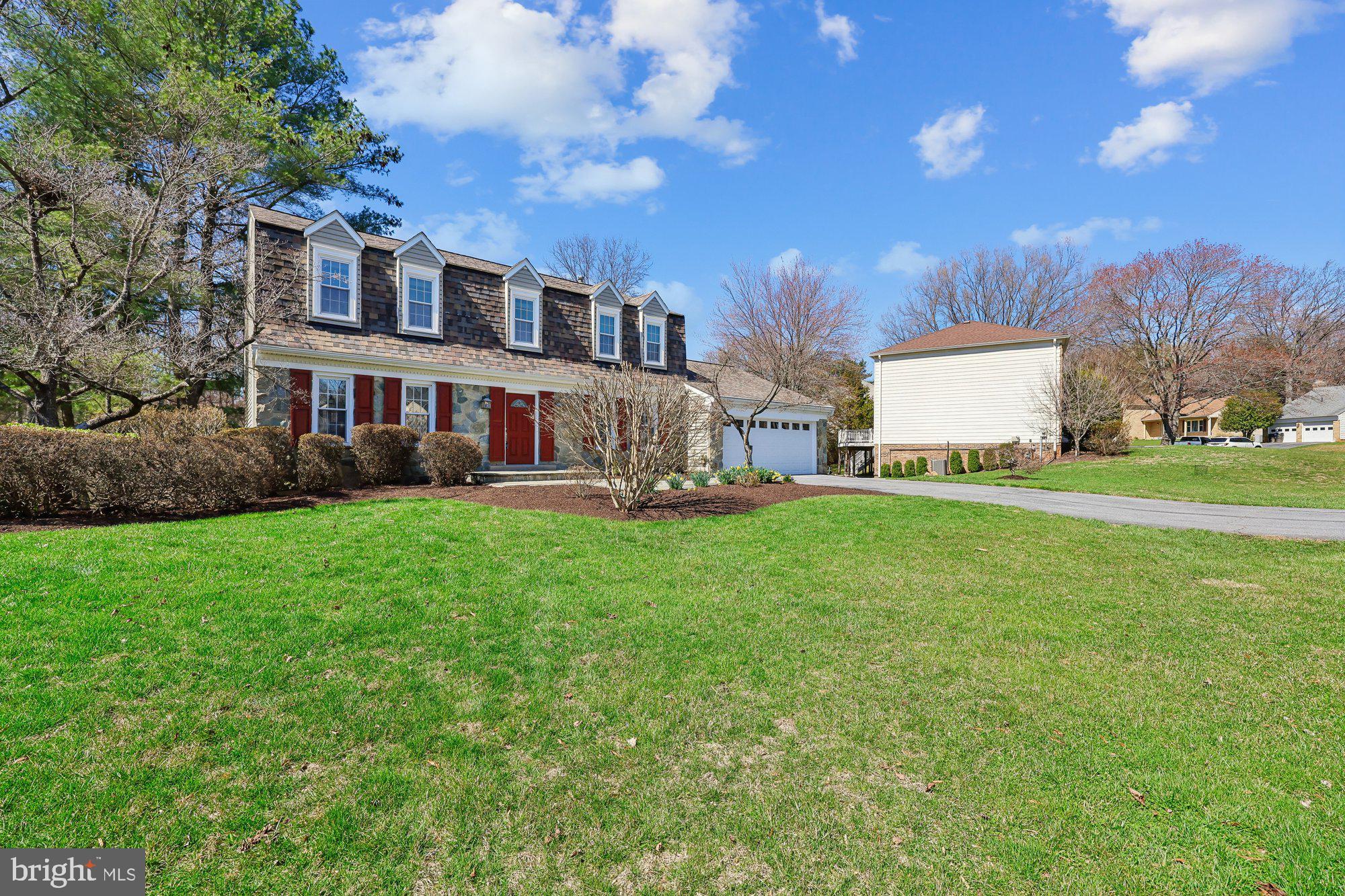 18 Kaywood Court Silver Spring, MD 20905 - Photo 3 of 71 a view of a house with a big yard and large trees