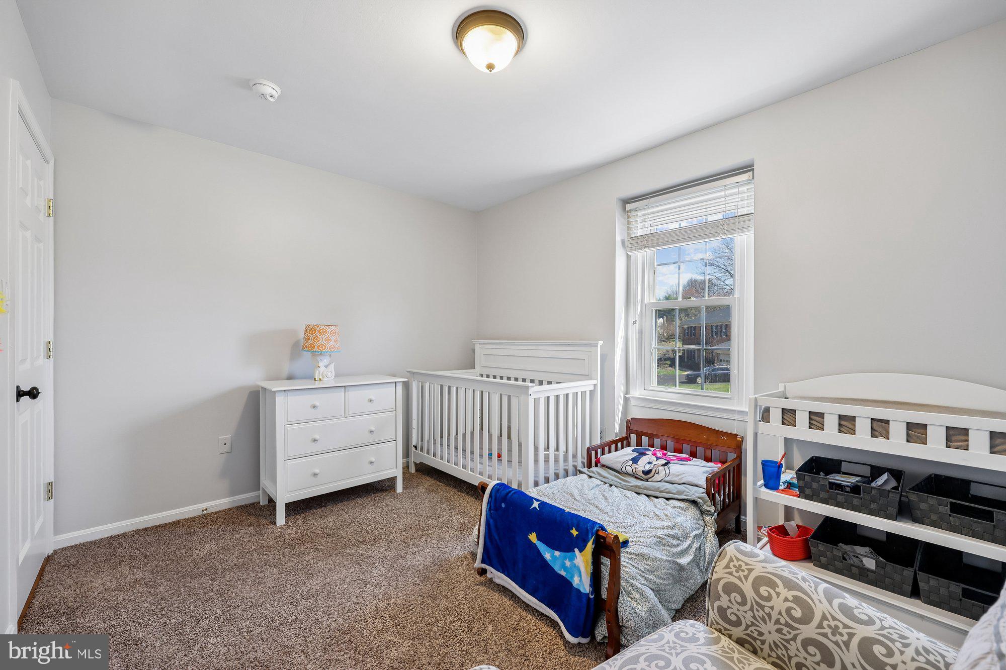 18 Kaywood Court Silver Spring, MD 20905 - Photo 47 of 71 a bed room with a bed and a window