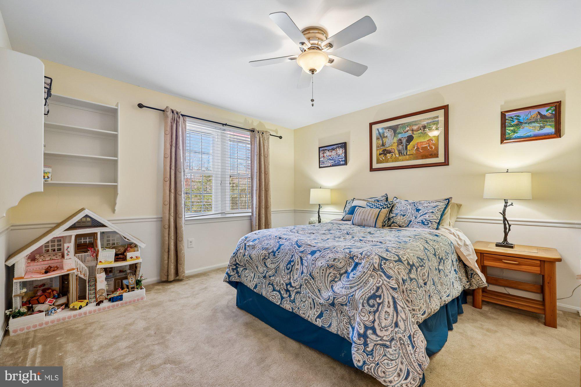 18 Kaywood Court Silver Spring, MD 20905 - Photo 53 of 71 a bedroom with a bed and a chandelier