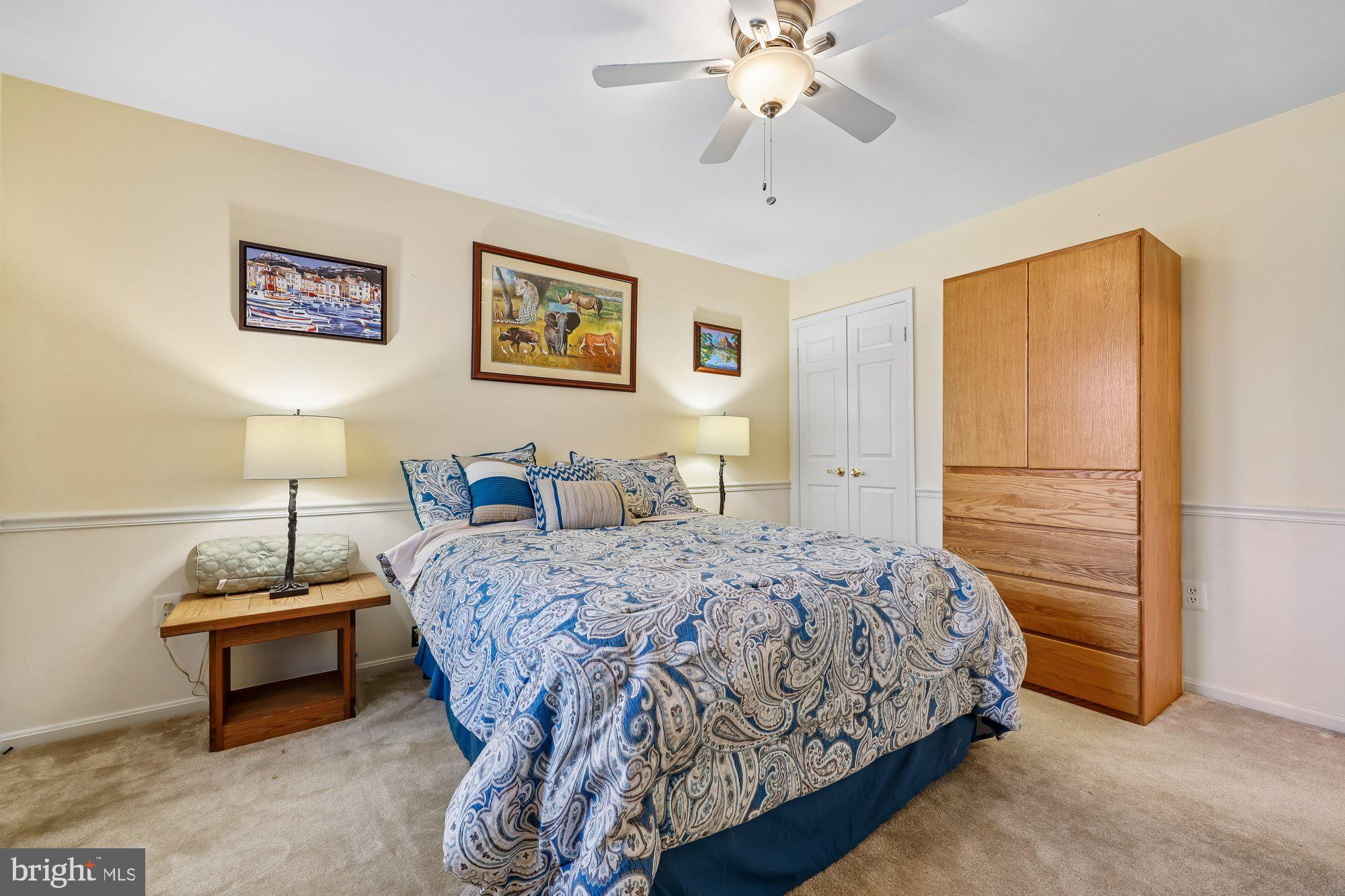 18 Kaywood Court Silver Spring, MD 20905 - Photo 55 of 71 a bedroom with a bed and a chandelier