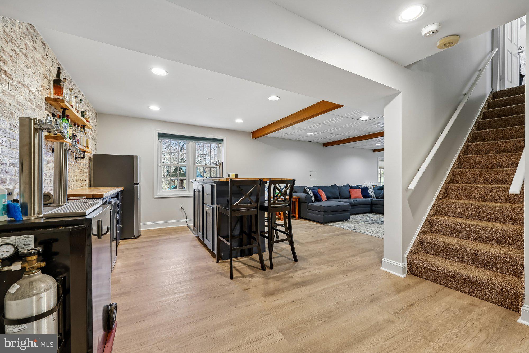 18 Kaywood Court Silver Spring, MD 20905 - Photo 60 of 71 a living room with furniture and a flat screen tv