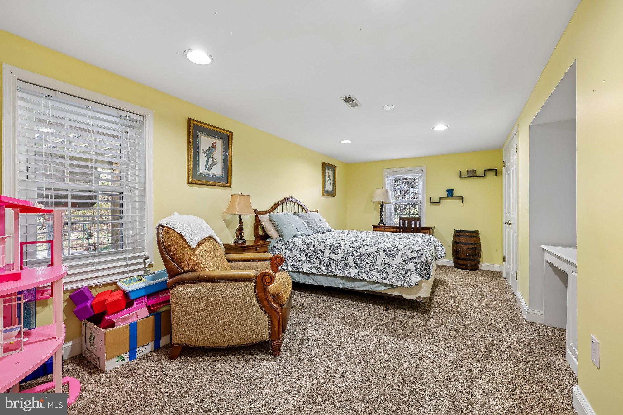 18 Kaywood Court Silver Spring, MD 20905 - Photo 67 of 71 a bedroom with bed and a couch