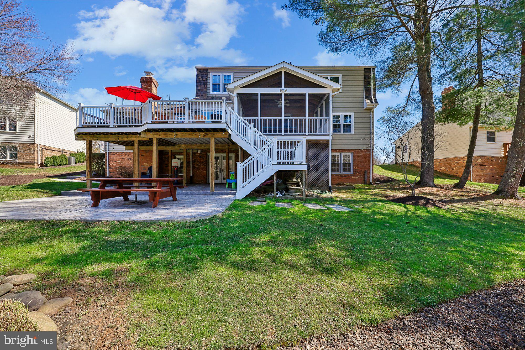 18 Kaywood Court Silver Spring, MD 20905 - Photo 7 of 71 a front view of a house with swimming pool and porch
