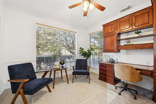 a workspace with furniture and a window