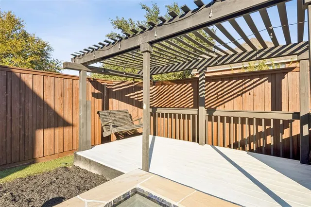 a house with swimming pool in front of it