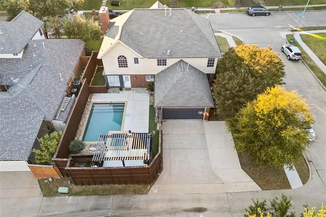 a front view of a house with garage