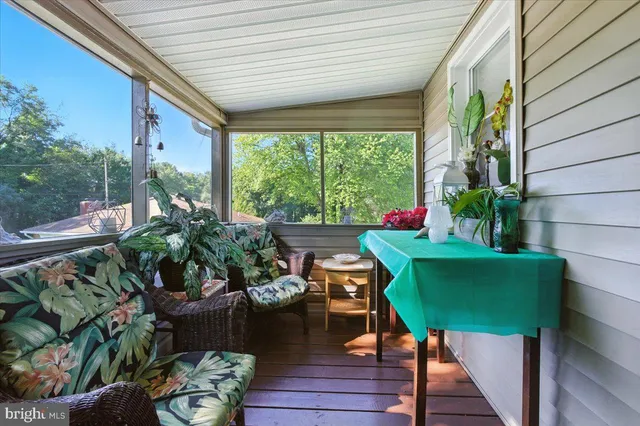 a outdoor living space with furniture and garden view