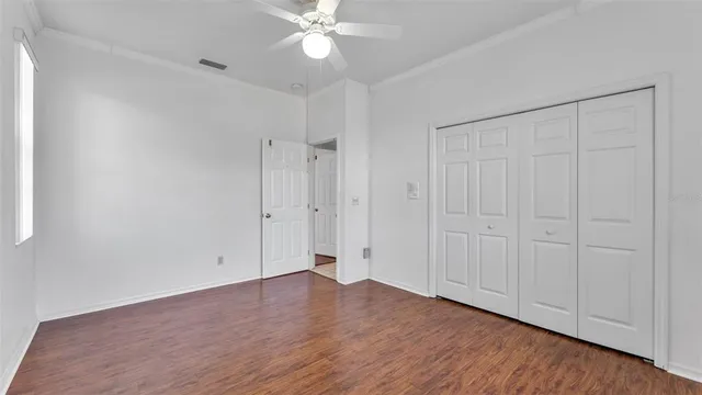 a view of a hallway with windows