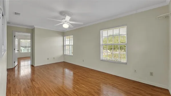 a house that has a tree in front of the house