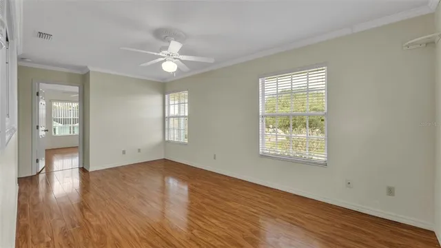 a house that has a tree in front of the house