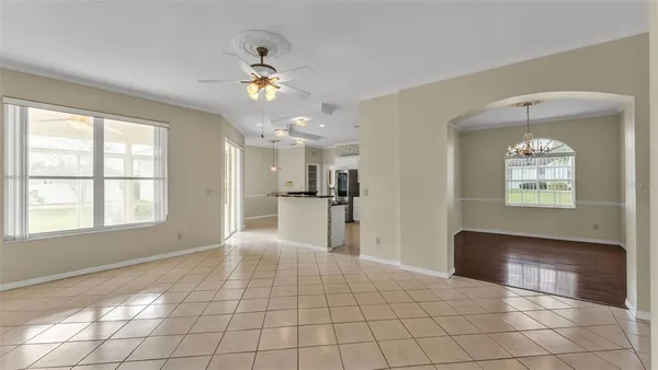a large kitchen with stainless steel appliances granite countertop a stove and a sink