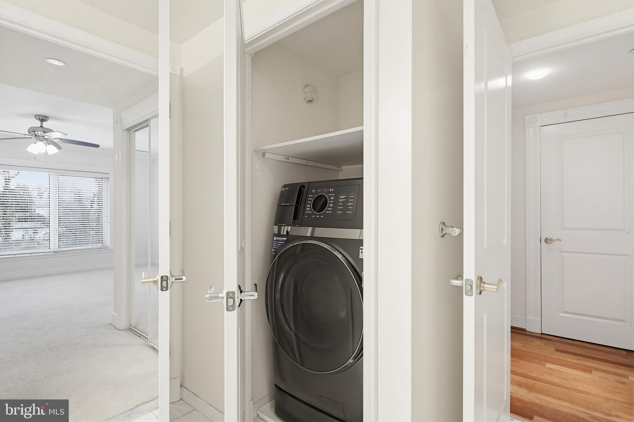 5 Park Place, Unit 425 Annapolis, MD 21401 - Photo 12 of 28 a view of a hallway with a washer and dryer