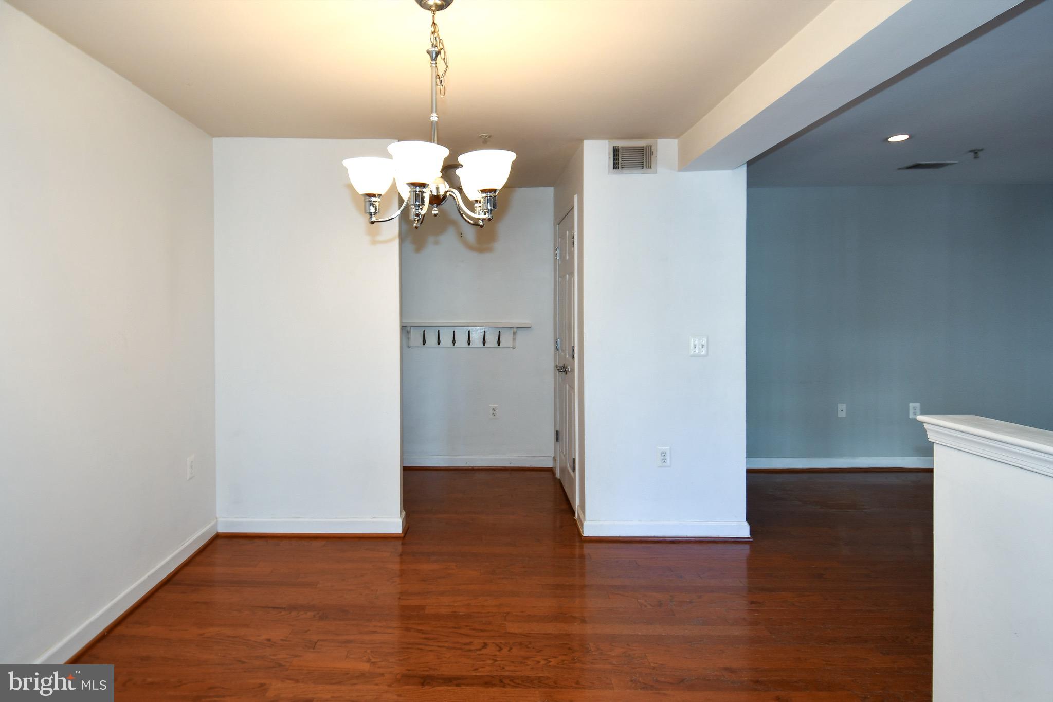 4127 South Four Mile Run Drive, Unit 304 Arlington, VA 22204 - Photo 12 of 44 a view of a room with wooden floor