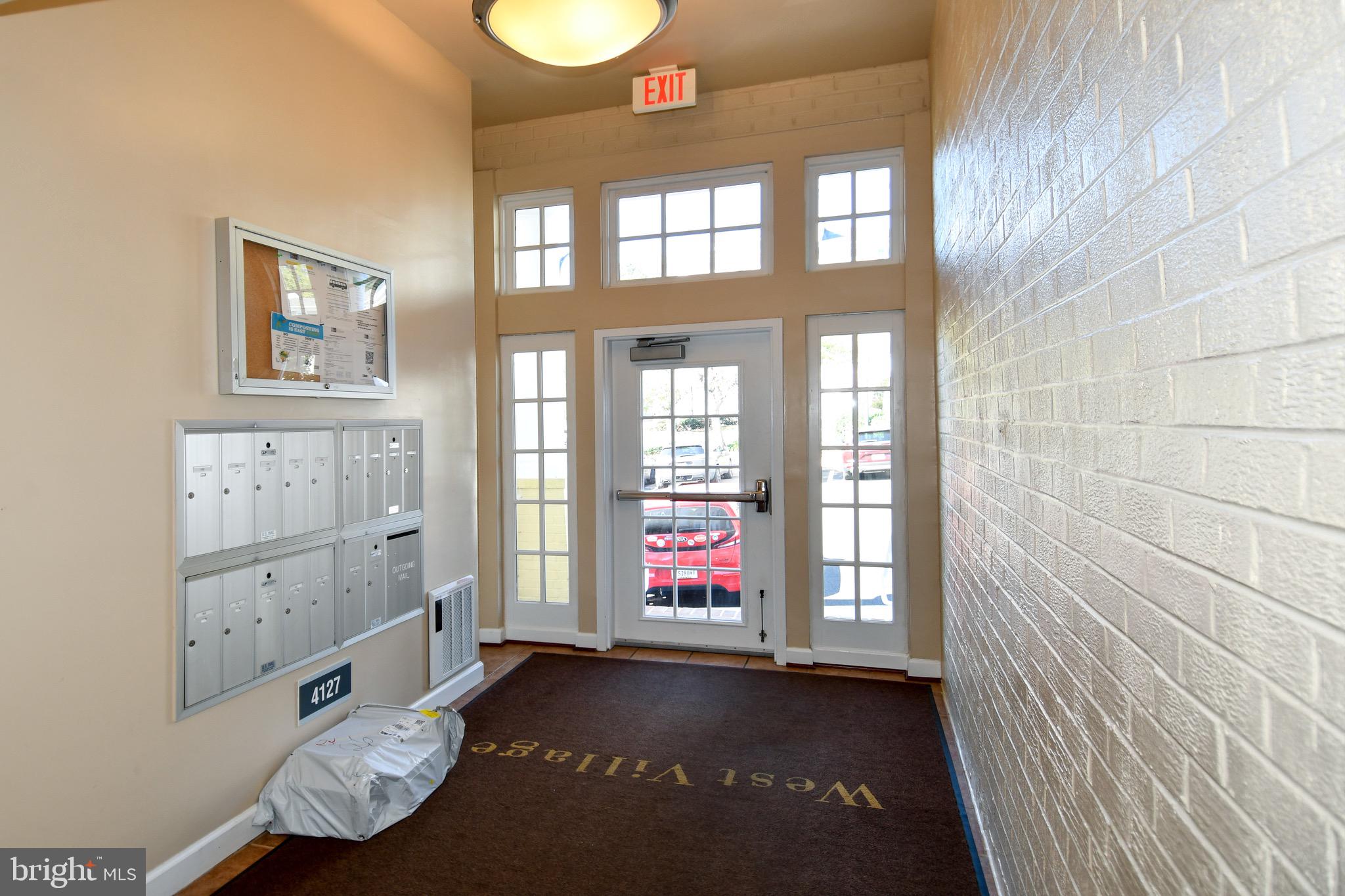 4127 South Four Mile Run Drive, Unit 304 Arlington, VA 22204 - Photo 2 of 44 a view of an entryway with wooden floor