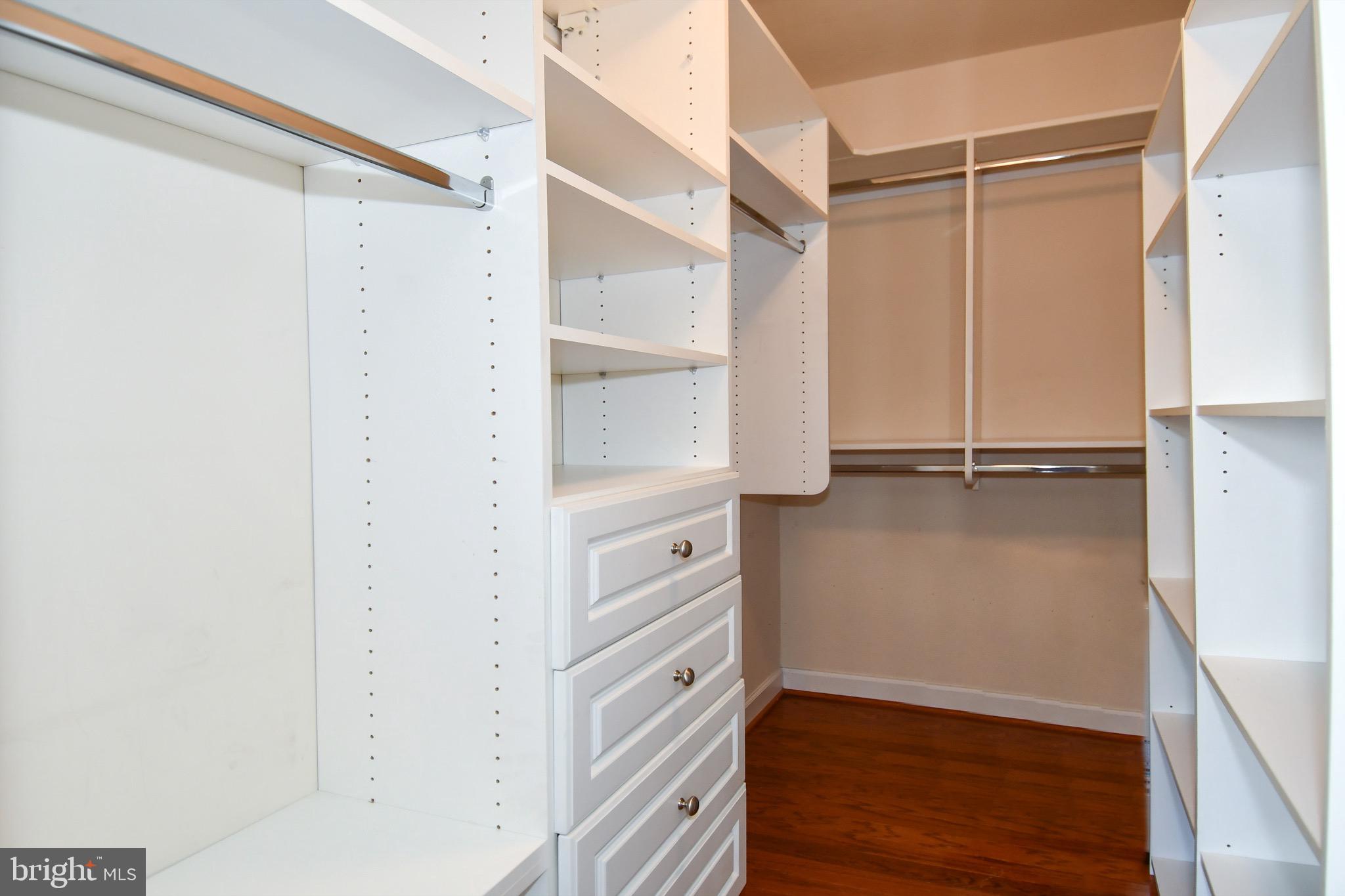 4127 South Four Mile Run Drive, Unit 304 Arlington, VA 22204 - Photo 23 of 44 a view of walk in closet with empty racks