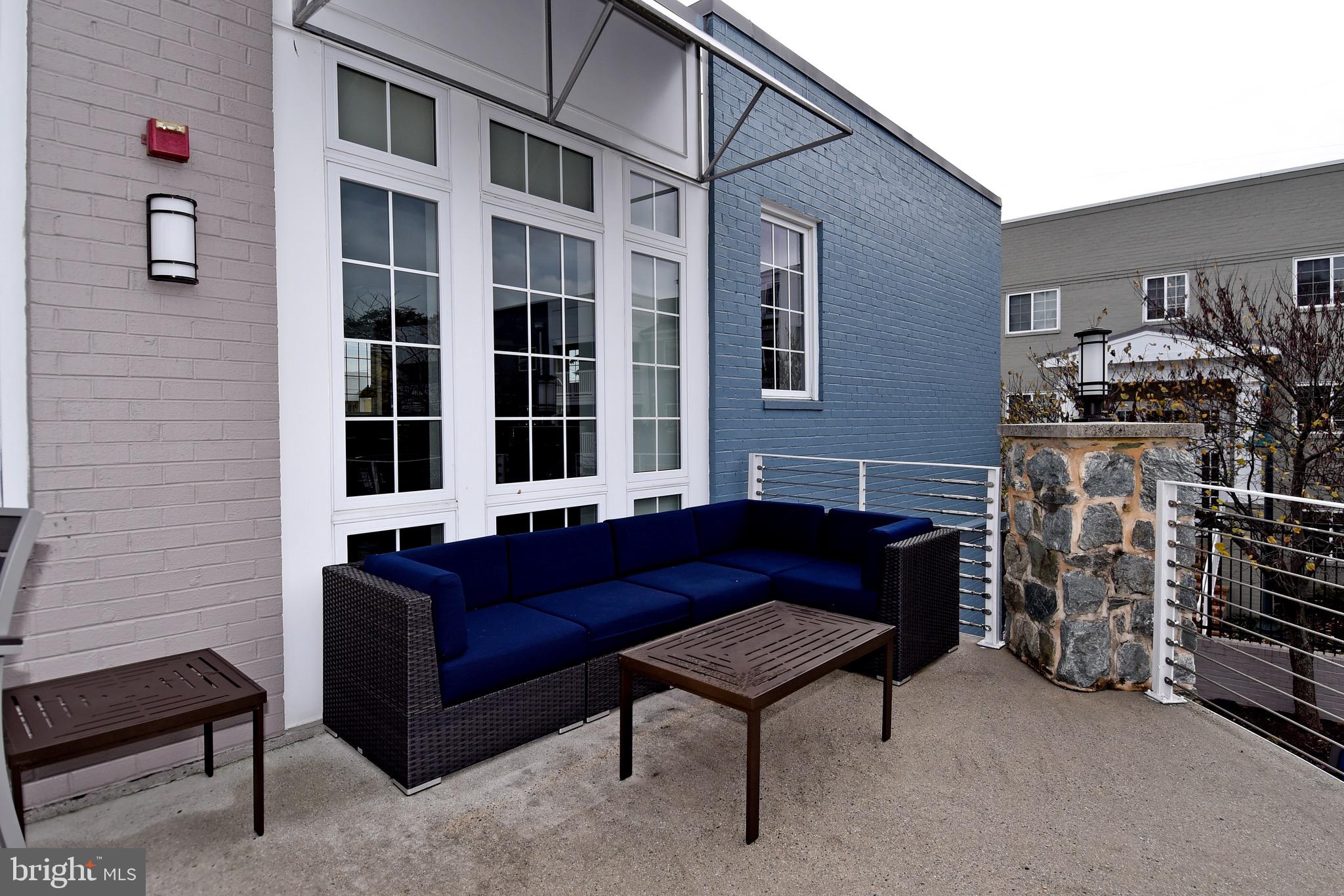 4127 South Four Mile Run Drive, Unit 304 Arlington, VA 22204 - Photo 38 of 44 a living room with furniture