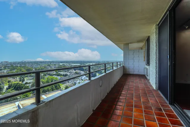 a view of city from a balcony