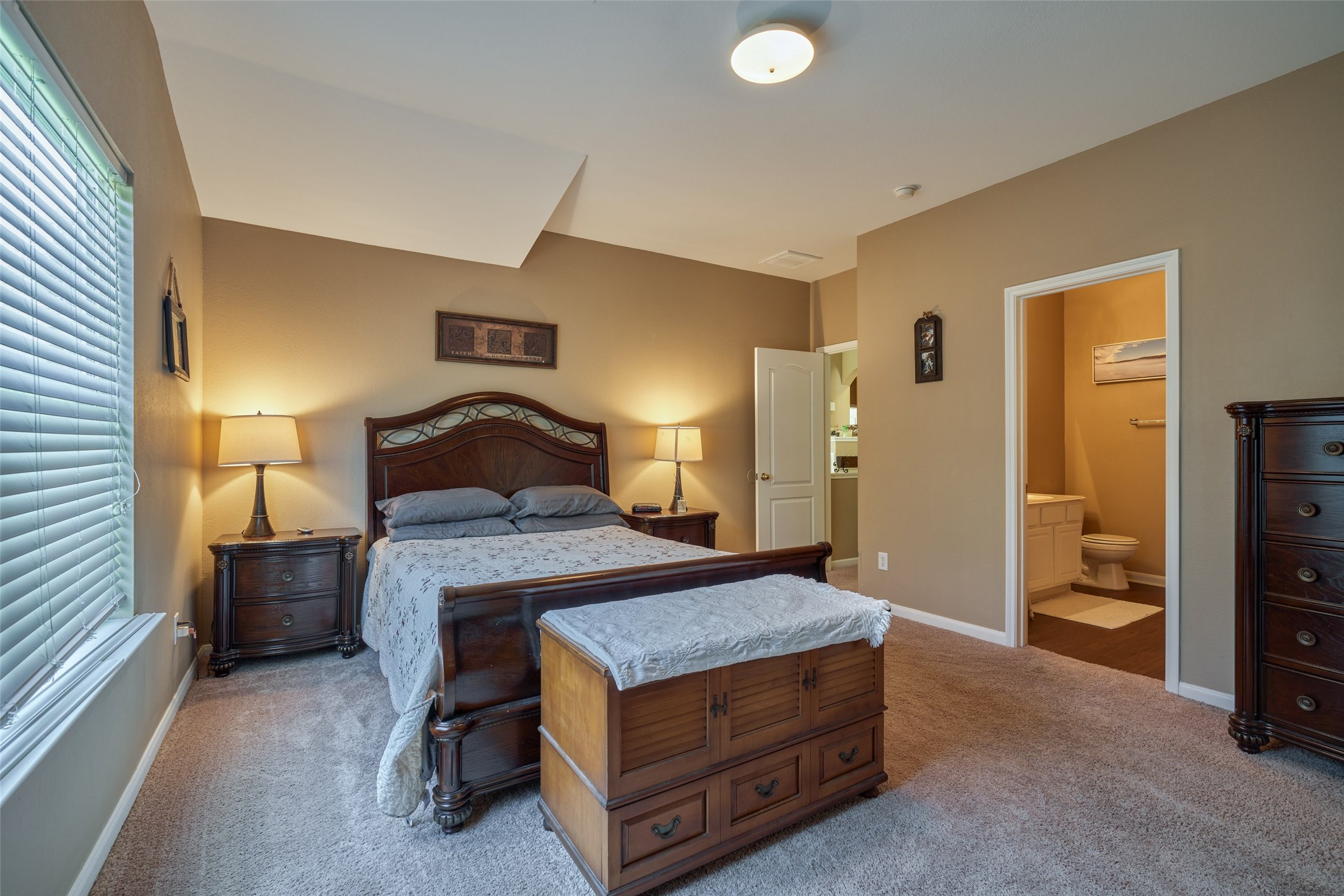 6214 Channelbrook Lane Spring, TX 77379 - Photo 29 of 29 a bedroom with a bed and a lamp