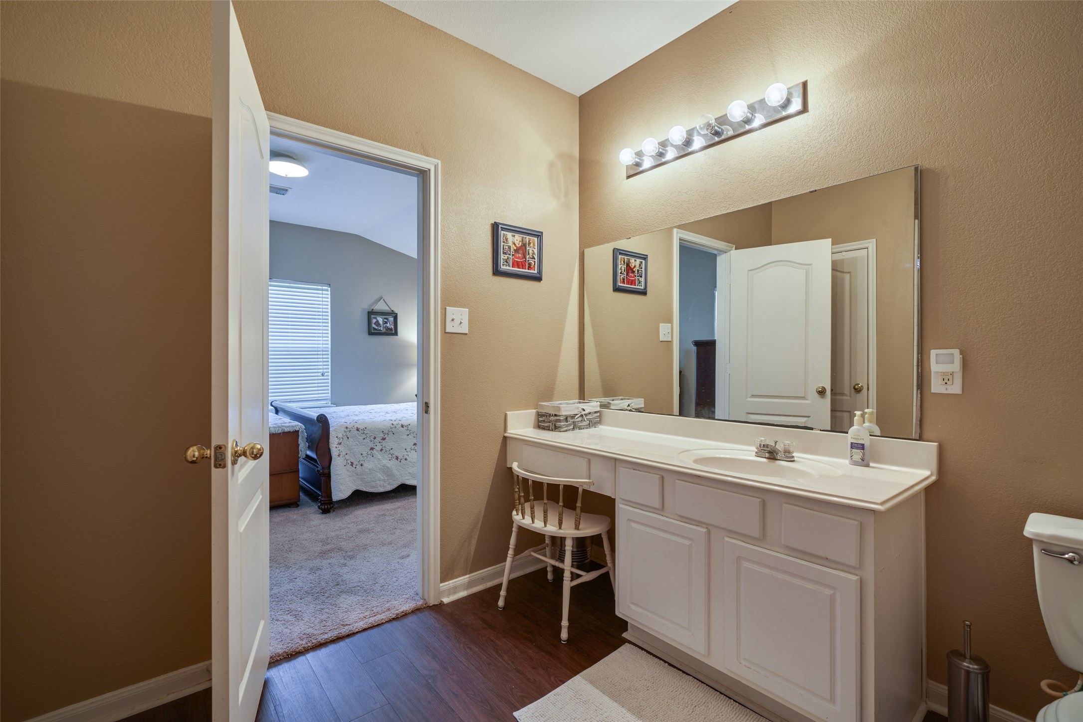 6214 Channelbrook Lane Spring, TX 77379 - Photo 20 of 29 a en suite bathroom with a sink double vanity and a mirror