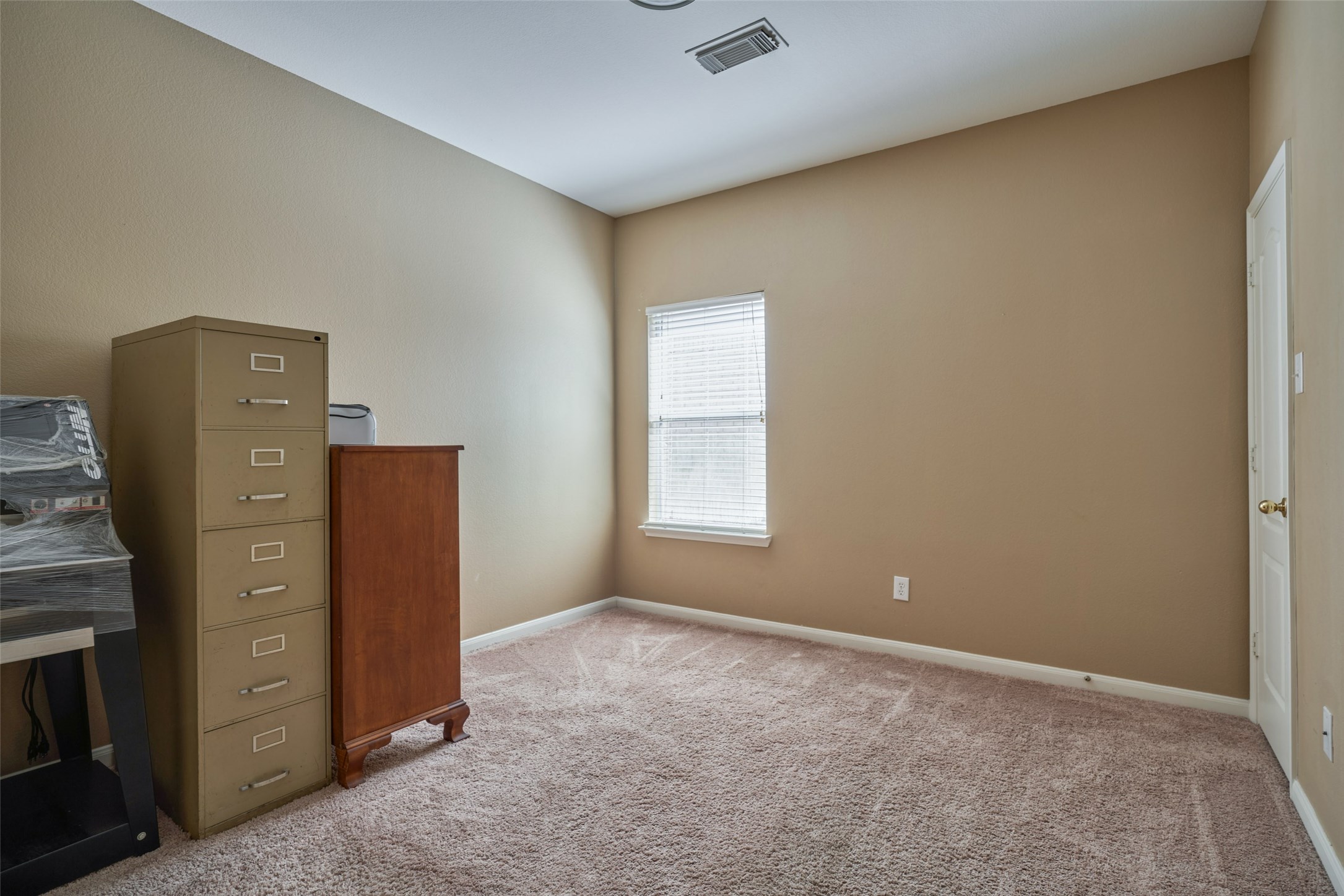 6214 Channelbrook Lane Spring, TX 77379 - Photo 24 of 29 a view of an empty room with a fireplace