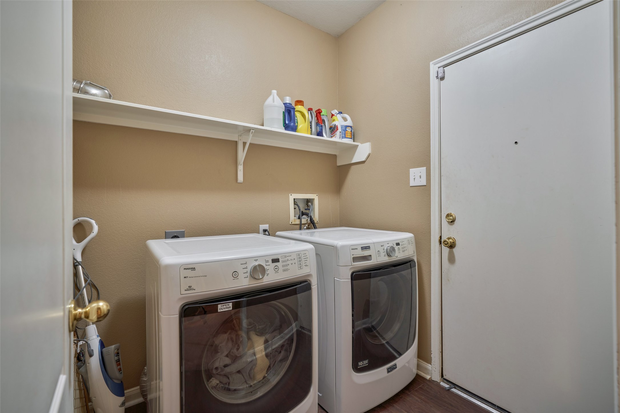 6214 Channelbrook Lane Spring, TX 77379 - Photo 25 of 29 a utility room with dryer and washer