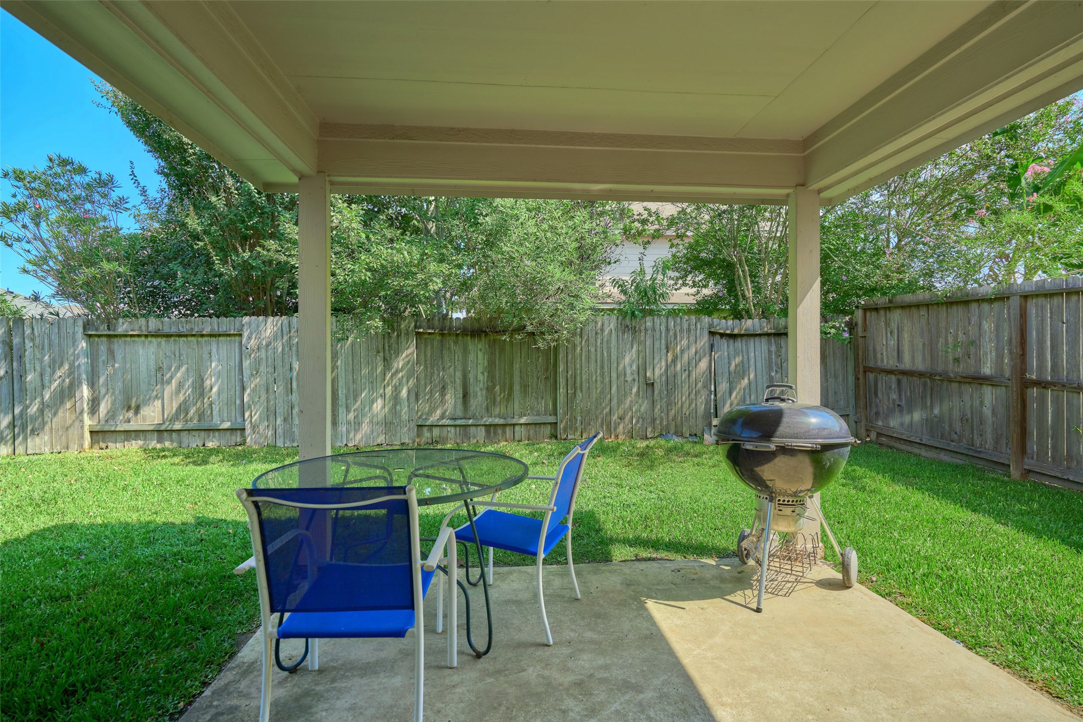 6214 Channelbrook Lane Spring, TX 77379 - Photo 26 of 29 a view of a chair in backyard of the house