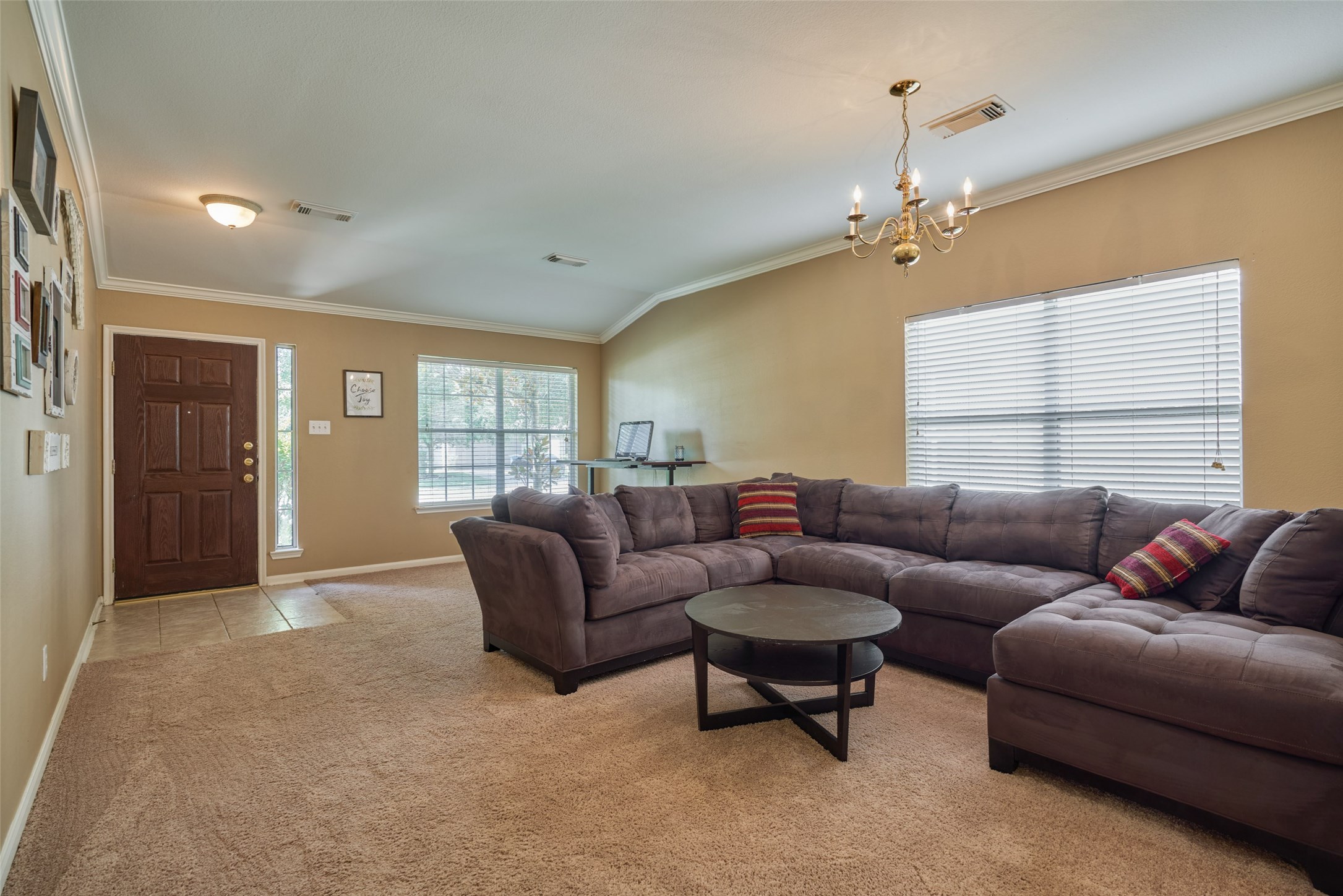 6214 Channelbrook Lane Spring, TX 77379 - Photo 6 of 29 a living room with furniture and a window