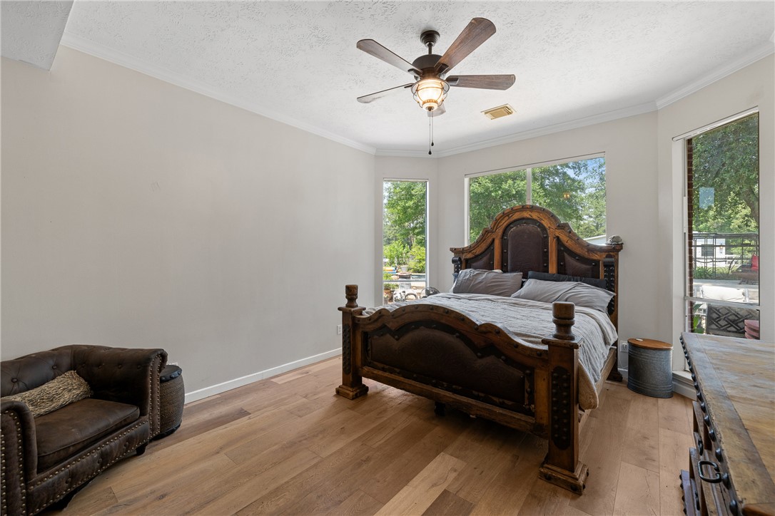 2092 Farm To Market 1486 Anderson, TX 77830 - Photo 11 of 42 a bedroom with a bed and a couch
